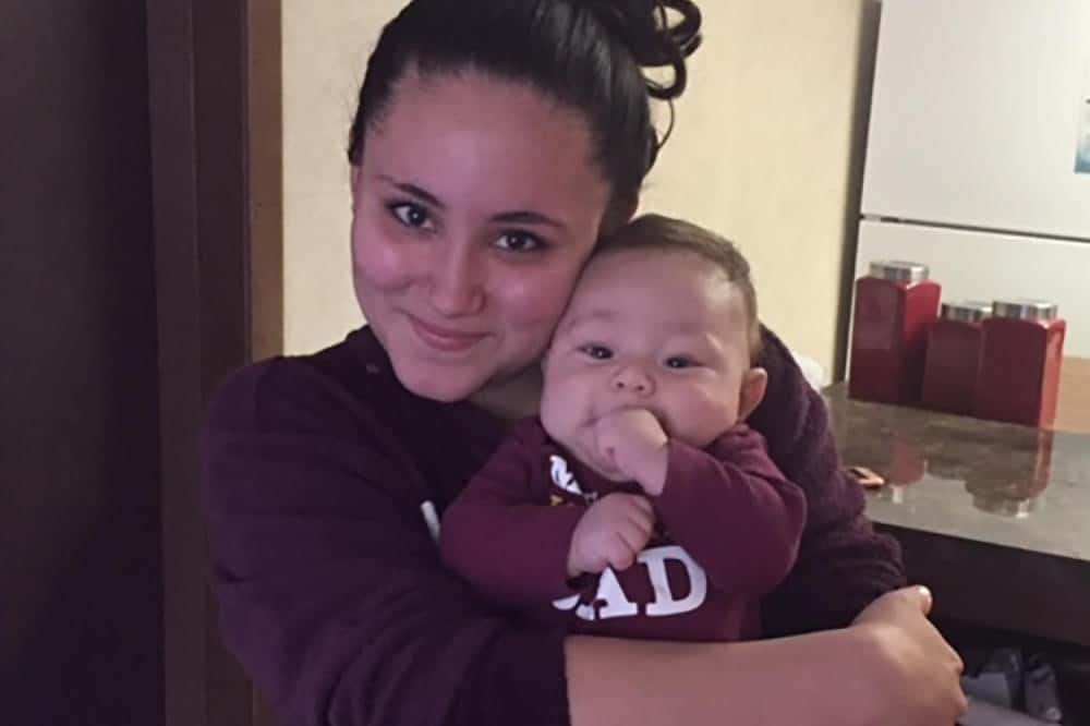 Katherine Peraza poses with her 3-month-old son.